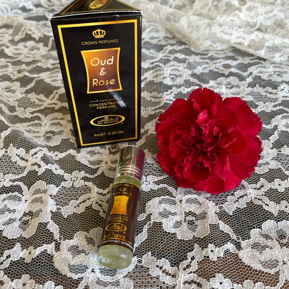 Oud & Rose .2 oz Perfume oil roller. Woody rose scent 
High quality. Men & women